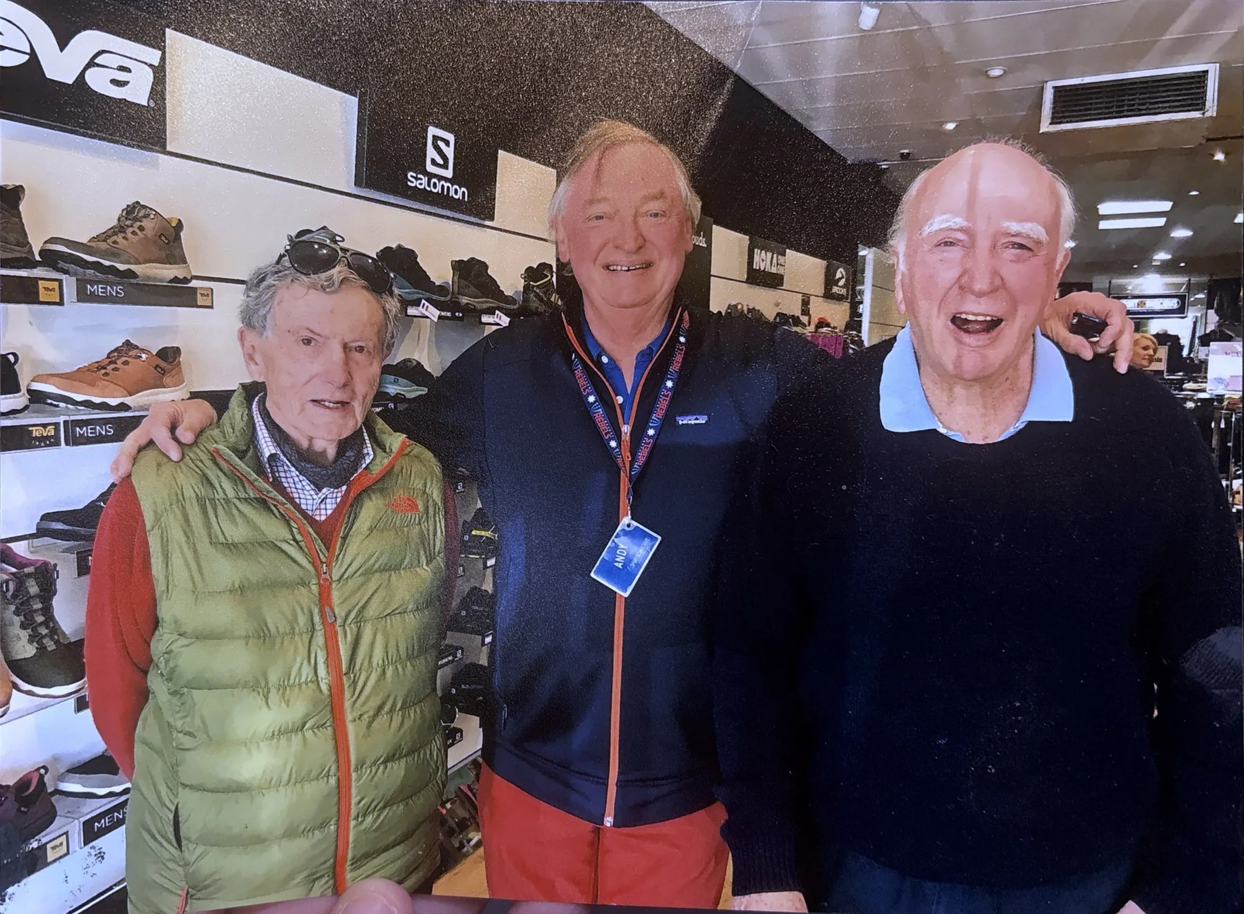 Andy with long-time friends inside Sports Conscious